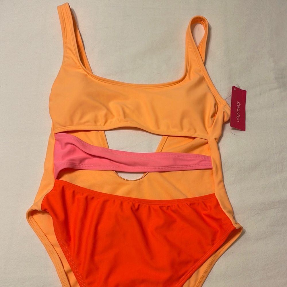 NWT One piece with cutouts!